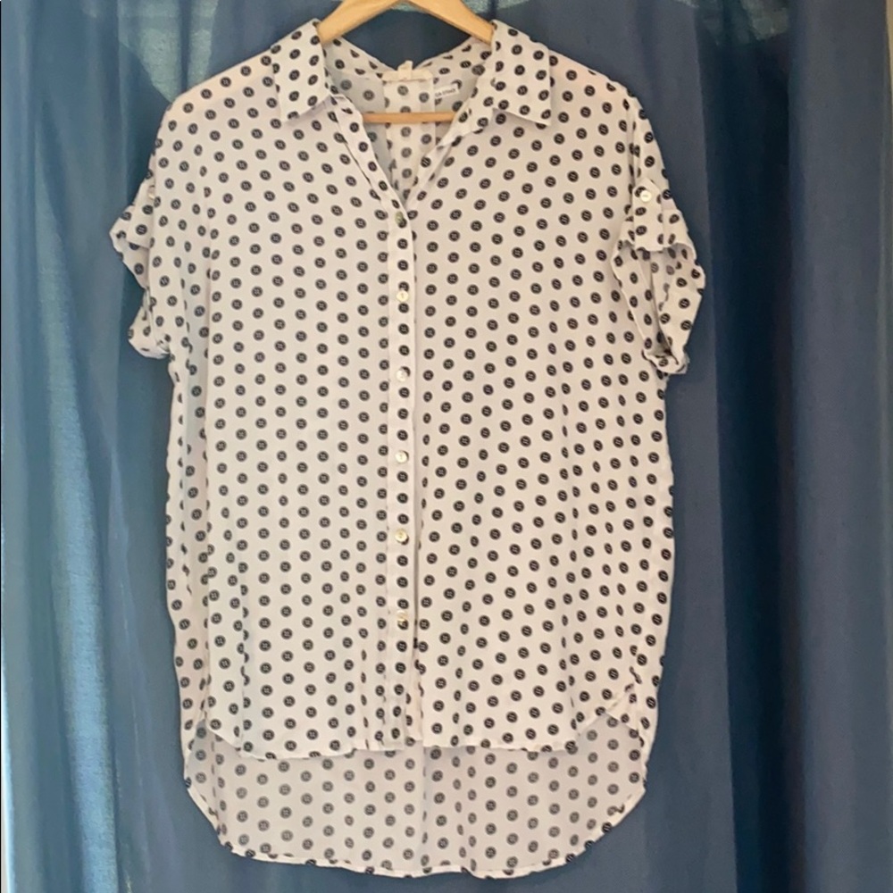 Cute white button up, decorated with buttons!